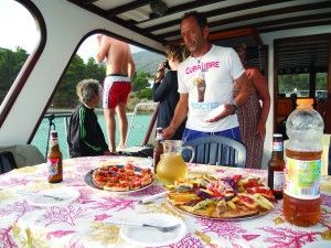 Marco presents lunch on his boat