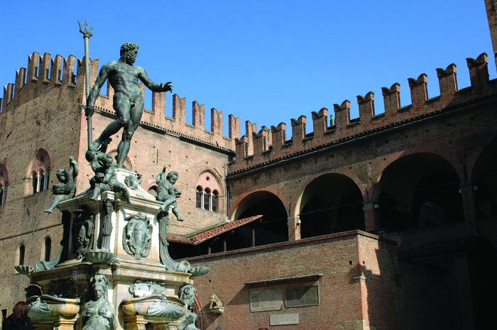 Neptune's fountain and the battlemented Palazzo di  Re Enzo Bologna Emilia Romagna Italy