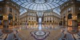 Milan, Italy - January 13, 2015: Famous Bull Mosaic in Galleria Vittorio Emanuele II in Milan. It's one of the world's oldest shopping malls, designed and built by Giuseppe Mengoni between 1865 and 1877.