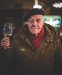 man drinking in Venice