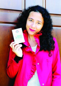 Marina Spironetti shows her brand new honorary passport of Seborga, which she purchased in a souvenir shop