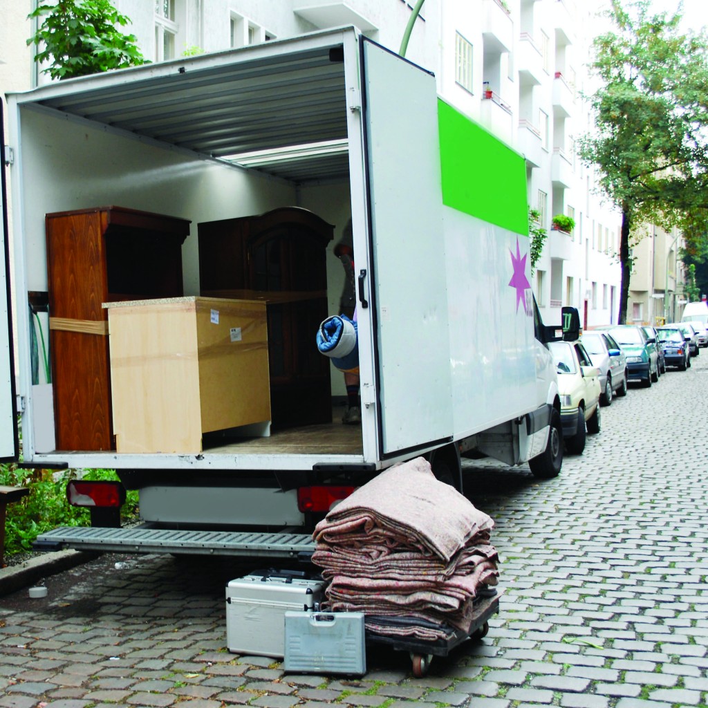 moving van with boxes and furniture