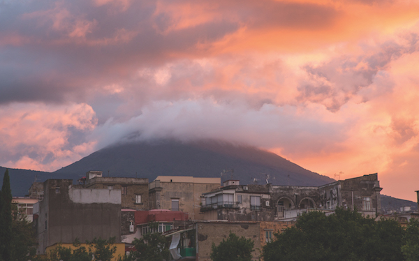 Vesuvius broods over Ercolano at dawn in Italy