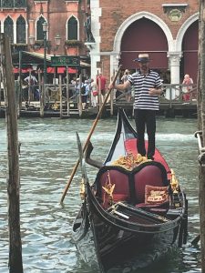 Gondolier Venice Italy