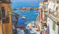 Picturesque Riomaggiore village with view of the sea, famous Cinque Terre, Italy.