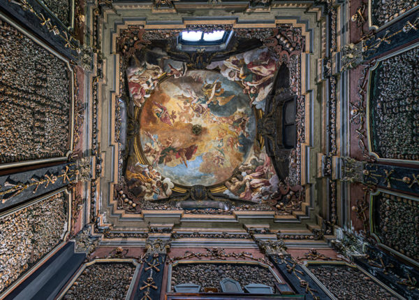 Bone walls and painted ceiling of the San Bernardino alle Ossa