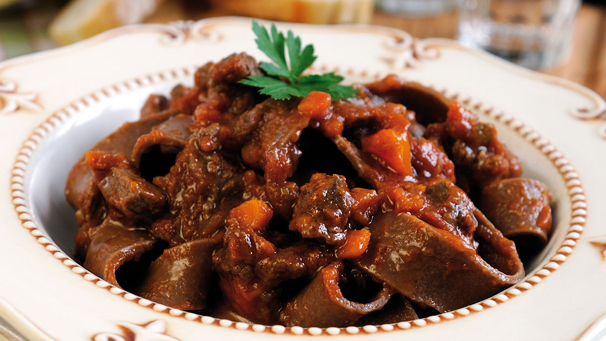 Chocolate-flavoured pappardelle with wild boar ragù