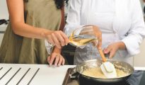 Cooking risotto Milan, Italy