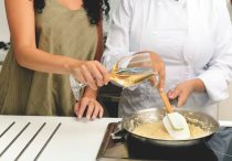 Cooking risotto Milan, Italy
