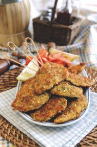 Chicken breast with a crust of parsley, pine nuts and Parmesan for picnic