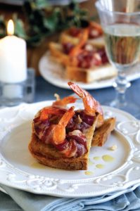 Pancetta-wrapped prawns on crostini