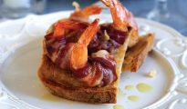Pancetta-wrapped prawns on crostini