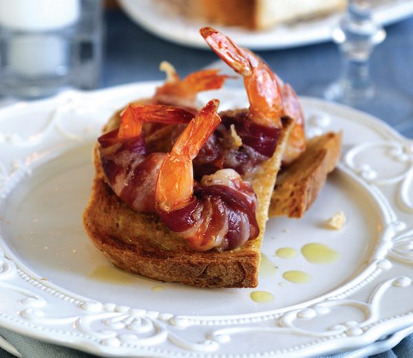 Pancetta-wrapped prawns on crostini