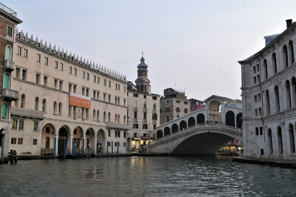 Rialto Bridge and Fondaco dei Tedeschi, with the bell tower of San Bartolomeo di Rialto beyond