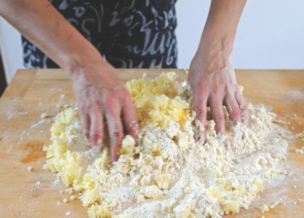 bringing dough together by hand