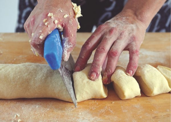 cutting dough into large chunks
