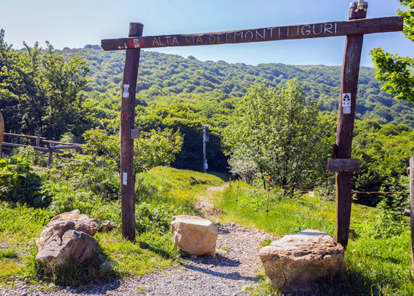 Signpost of the high way of the Ligurian mountains ( Alta Via dei Monti Liguri) near the Faiallo Pass in the province of Genoa, Italy