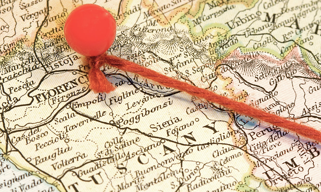 Tuscany travel guide: vintage map of Italy with pin in Florence