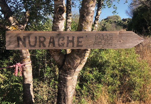 Old, worn sign with 'Nuraghe" hand-written