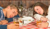 couple experiencing 'abbiocco' after big meal