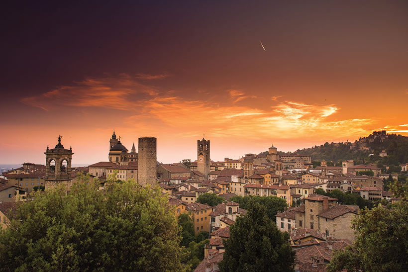 bergamo citta alta and its towers at sunset