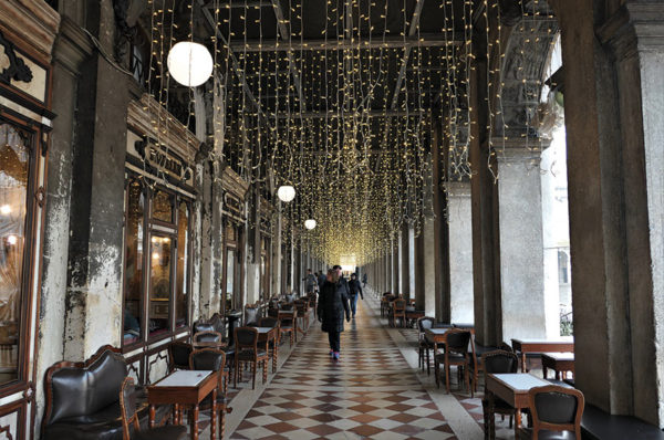 Arcade of the Procuratie Nuove with Christmas lights