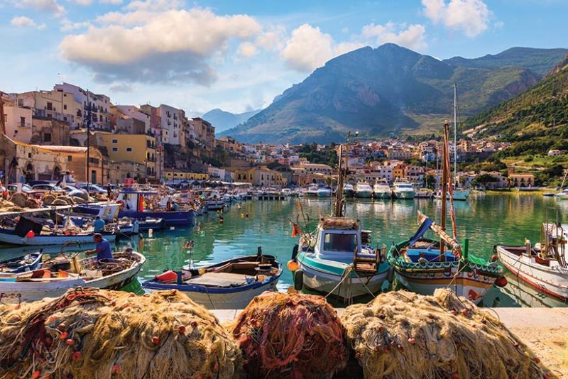 Sicilian port with fishing boats of Castellammare del Golfo village of Sicily