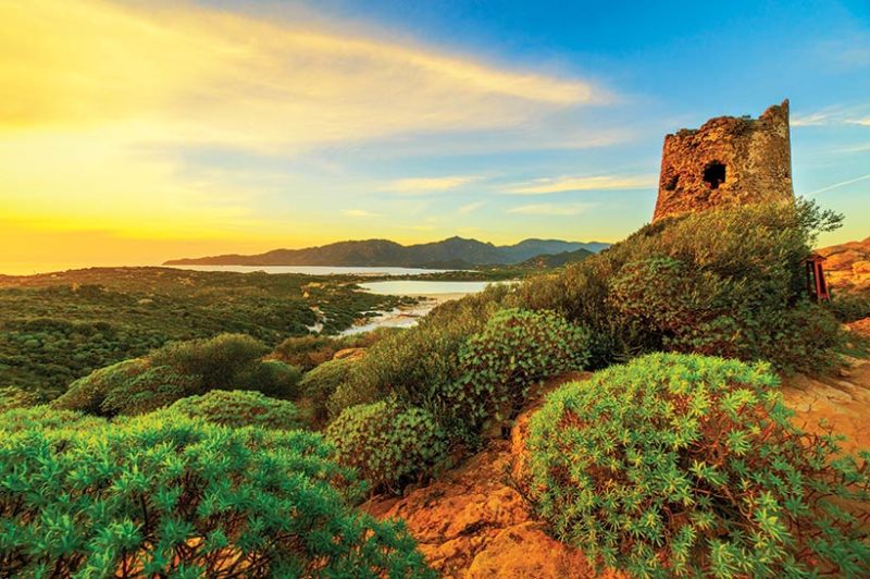 Sunset over old tower of Villasimius, Sardinia