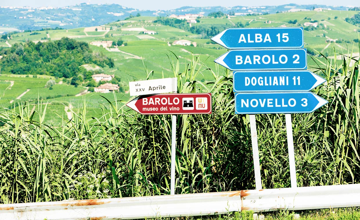 Italian signposts to represent things to do in Le Langhe