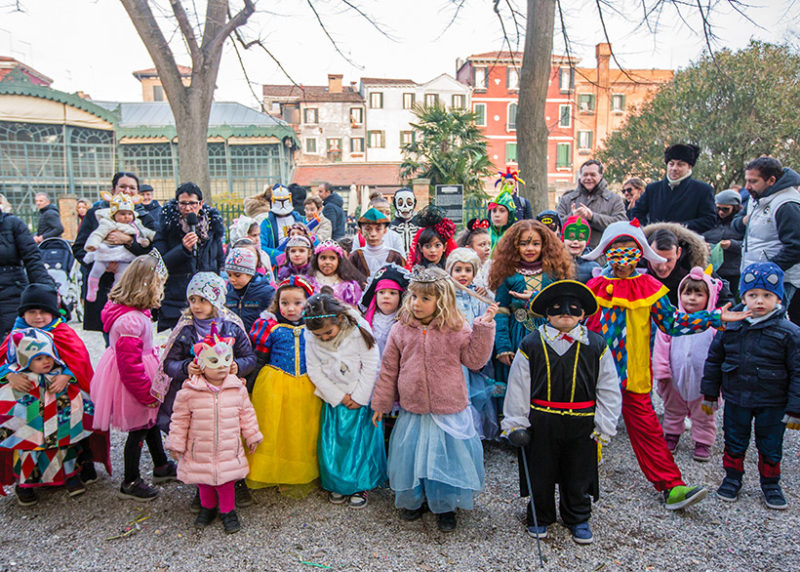 Children in costume during venice carnival