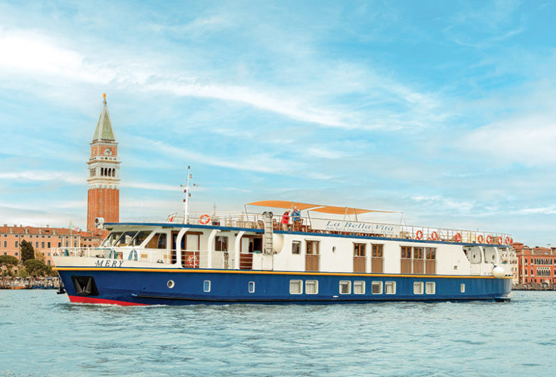 cruise boat on venice waterway