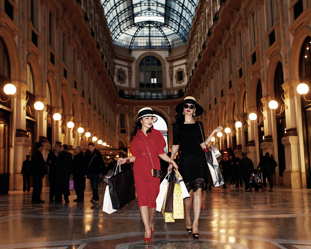 Milan fashion - women shopping in Galleria Vittorio Emanuele in Milan