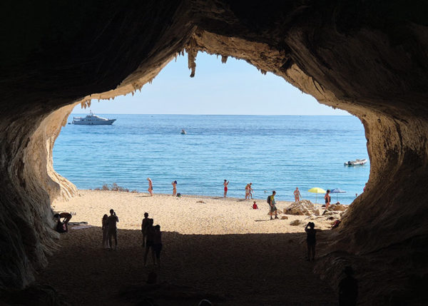 view of beach from inside a cave