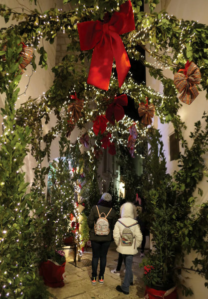 Thickly decorated lane at night