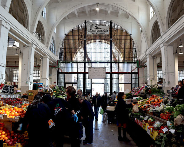 view of large glass frontage from inside covered market