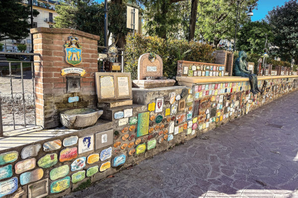 low wall covered in ceramic tiles